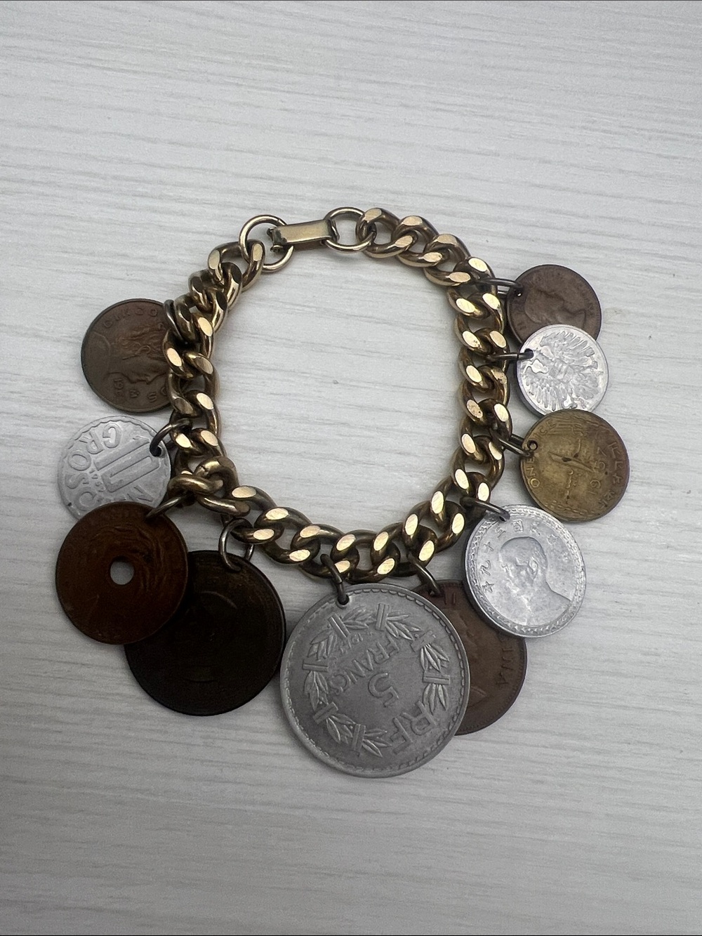 Gold-Tone Curb Charm Bracelet with Mixed Metal Coin Charms